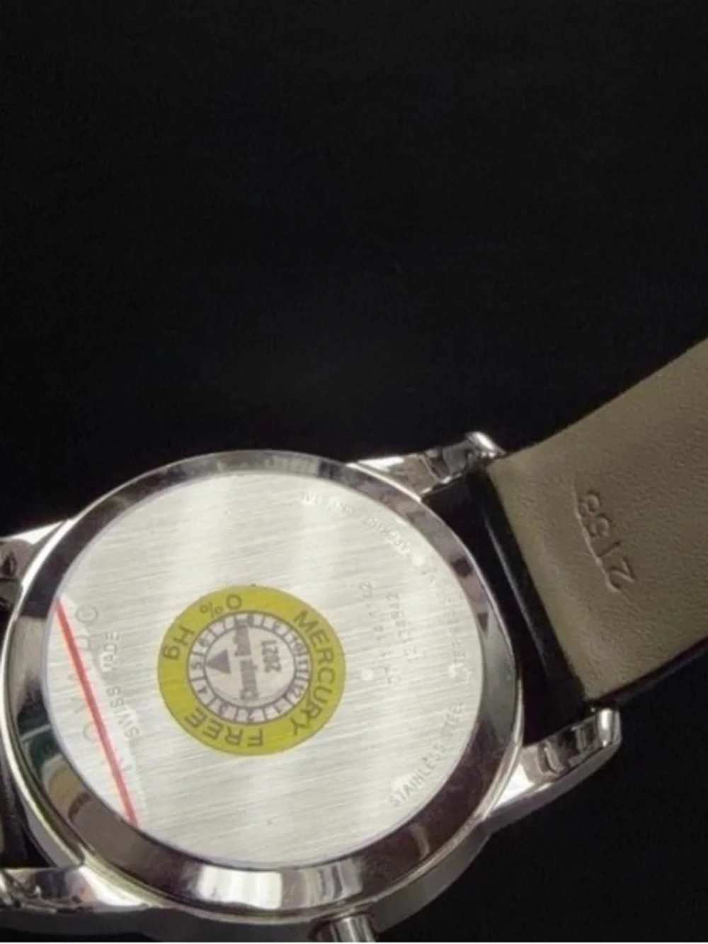 Movado Black Dial Watch with Gold Hands